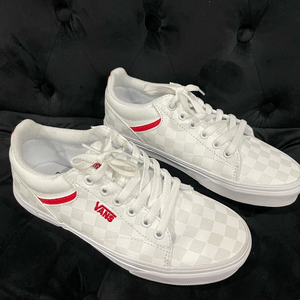 White end red vans.